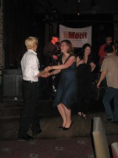 Emma and Matt trying their feet at salsa dancing